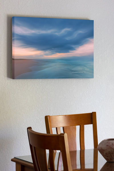 I captured this image by accident. I was standing at the waters edge with my tripod photographing when a large wave washed ashore, I had to grab the camera and run for it. This is how it turned out. This photo was taken at Frisco Beach on Cape Hatteras National Seashore.