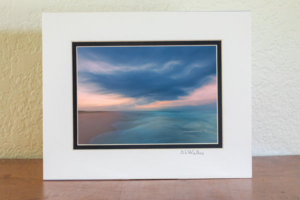 I captured this image by accident. I was standing at the waters edge with my tripod photographing when a large wave washed ashore, I had to grab the camera and run for it. This is how it turned out. This photo was taken at Frisco Beach on Cape Hatteras National Seashore.
