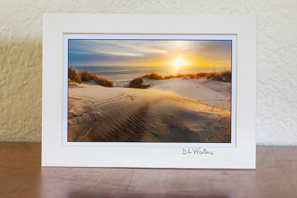 Sunrise through the mist on a winters morning at Oregon Inlet Campground Cape Hatteras National Seashore, Outer Banks of North Carolina.