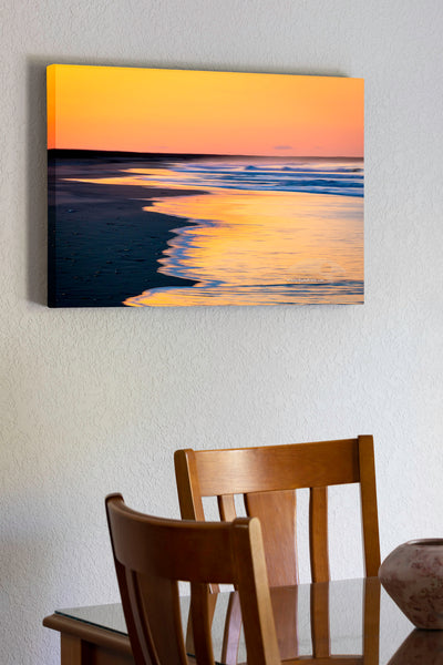 A longer exposure showing the motion in the waves at Frisco Beach in Cape Hatteras National Seashore on the Outer Banks of North Carolina.