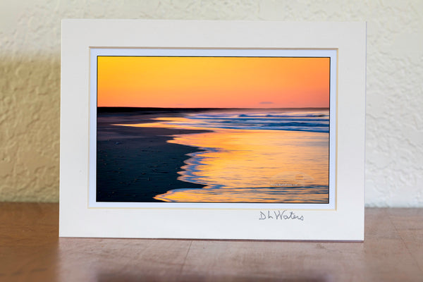 A longer exposure showing the motion in the waves at Frisco Beach in Cape Hatteras National Seashore on the Outer Banks of North Carolina.