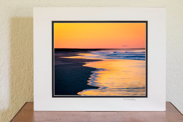 A longer exposure showing the motion in the waves at Frisco Beach in Cape Hatteras National Seashore on the Outer Banks of North Carolina.
