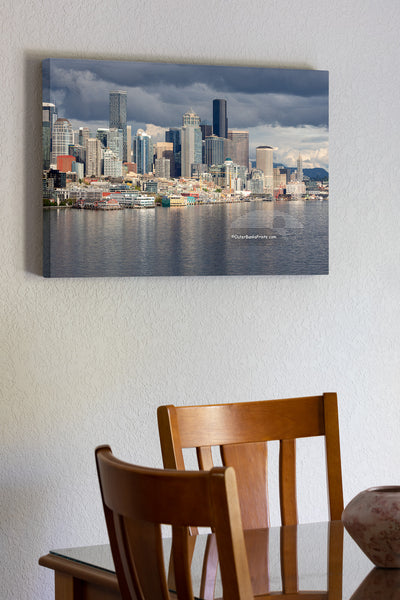 Seattle skyline on a stormy afternoon. The light had just broken through the clouds, making the skyline stand out from the dark clouds.