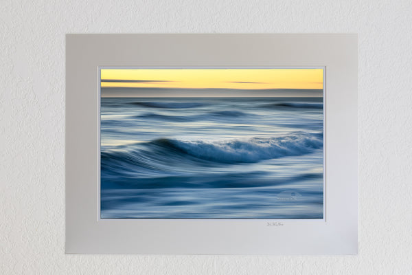13 x 19 luster print in 18 x 24 ivory mat of Motion of the early morning surf at Kitty Hawk on the Outer Banks of NC.