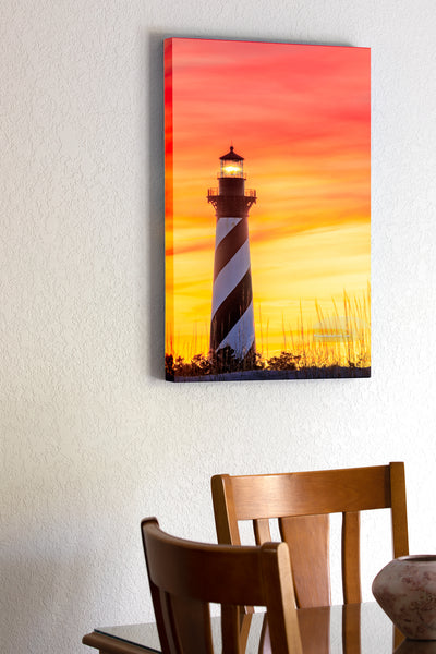 20"x30" x1.5" stretched canvas print hanging in the dining room of Sunset sky at Cape Hatteras Lighthouse on the Outer Banks of NC.