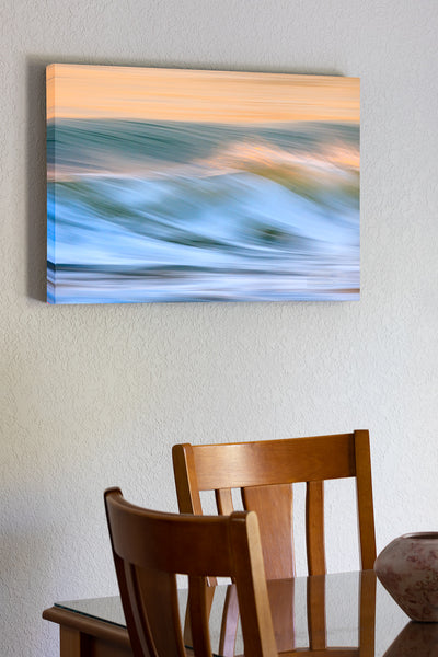 20"x30" x1.5" stretched canvas print hanging in the dining room of Long shutter speed showing the motion of the surf at sunrise on the Outer Banks.