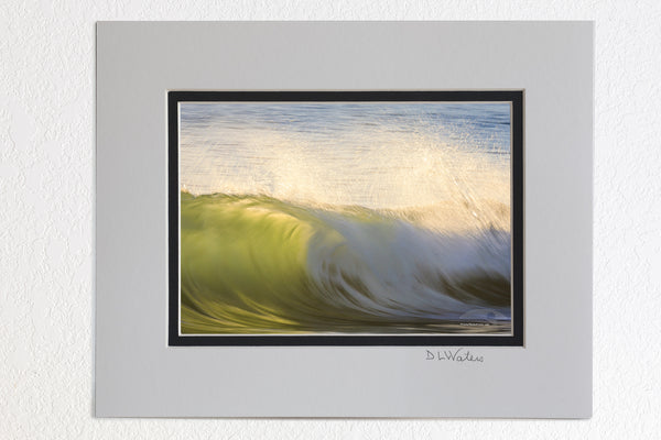 5 x 7 luster prints in a 8 x 10 ivory and black double mat of  See through green surf on the Outer Banks of NC.