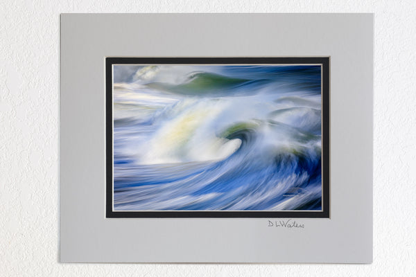 5 x 7 luster prints in a 8 x 10 ivory and black double mat of  Huge waves captured with a slow shutter speed to show movement from the end of Avalon Fishing Pier in kill Devil Hills on the Outer Banks of North Carolina.