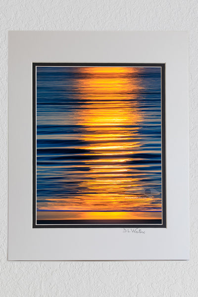8 x 10 luster print in a 11 x 14 ivory and black double mat of Moving the camera back-and-forth while the shutter was open created these lines of light in the ocean surf on the Outer Banks of North Carolina.