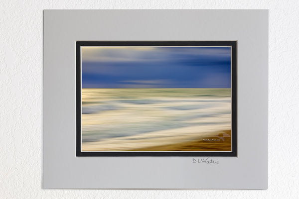 5x7 Luster print in a 8x10 ivory and black double mat of Long sunrise exposure while moving the camera of a Outer Banks beach.