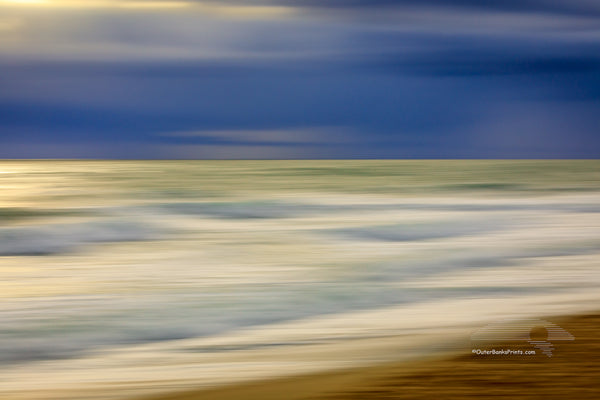 Long sunrise exposure while moving the camera of a Outer Banks beach.