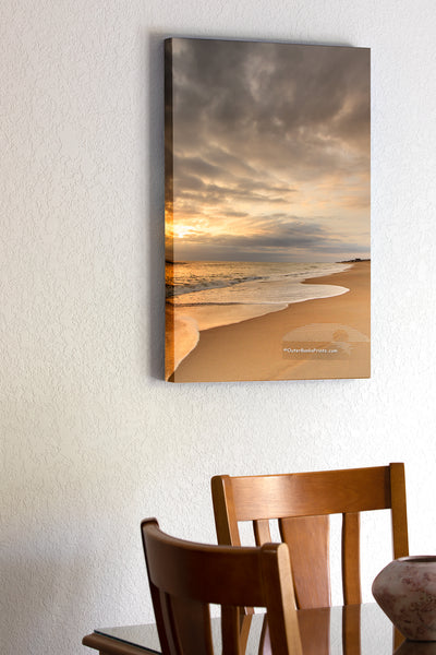 20"x30" x1.5" stretched canvas print hanging in the dining room of Stormy sky at Kitty Hawk beach on the Outer Banks.
