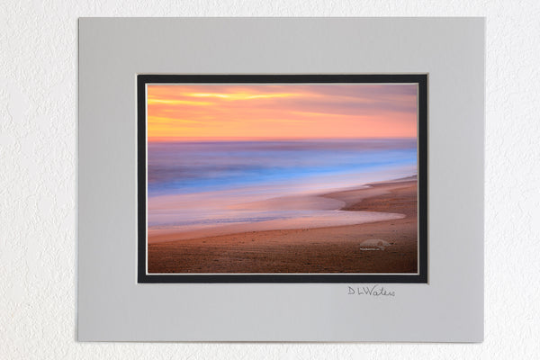 5 x 7 luster prints in a 8 x 10 ivory and black double mat of  A long twilight exposure of Nags Head beach on the Outer Banks of North Carolina.
