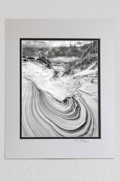 8 x 10 luster print in a 11 x 14 ivory and black double mat of Black and white sand dune and sky in Corolla on the Outer Banks of North Carolina.