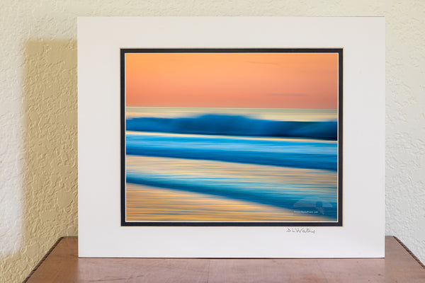 This is an impressionistic long exposure while moving the camera on a beautiful morning sunrise at Cape Hatteras National Seashore in Frisco on the Outer Banks of North Carolina.