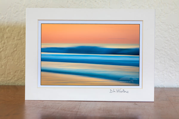 This is an impressionistic long exposure while moving the camera on a beautiful morning sunrise at Cape Hatteras National Seashore in Frisco on the Outer Banks of North Carolina.