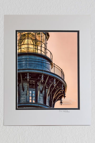 8 x 10 luster print in a 11 x 14 ivory and black double mat o A close-up stylized photo of Bodie Island Lighthouse's Fresnel lens on the Outer Banks of North Carolina.