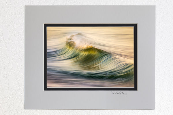 5 x 7 luster prints in a 8 x 10 ivory and black double mat of  Motion of the early morning surf on the beach at Kitty Hawk on the Outer Banks of NC.