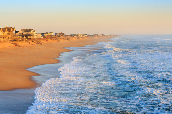Empty beach photographed from Kitty Hawk Fishing Pier on the Outer Banks of NC.