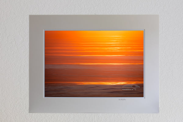13 x 19 luster print in 18 x 24 ivory mat of Kitty Hawk Surf at sunrise with a long shutter speed and camera movement.