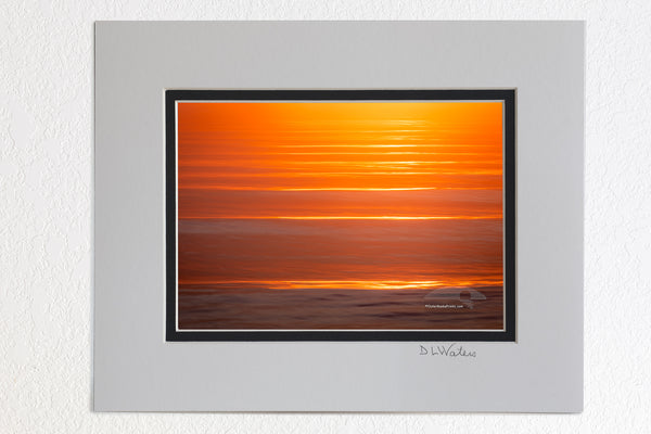 5 x 7 luster prints in a 8 x 10 ivory and black double mat of  Kitty Hawk Surf at sunrise with a long shutter speed and camera movement.