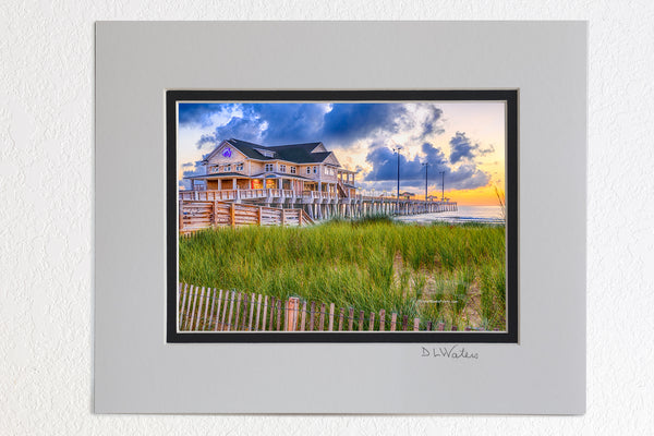 5 x 7 luster prints in a 8 x 10 ivory and black double mat of Sand fence, sea oats, and sunrise at Jennette's Pier Nags Head, North Carolina.