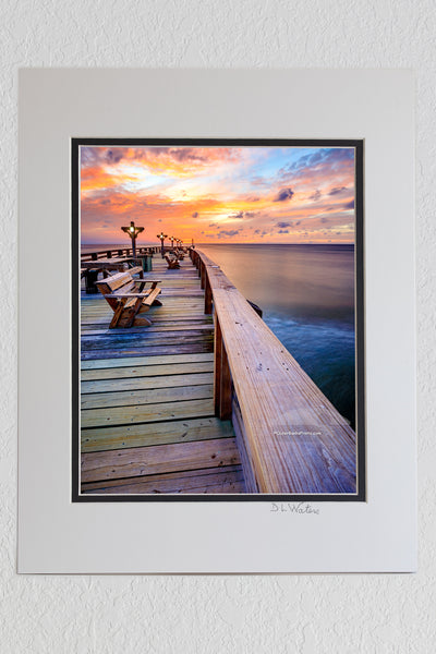 8 x 10 luster print in a 11 x 14 ivory and black double mat of Peaceful sunrise at Kitty Hawk Fishing Pier on the Outer Banks of NC.