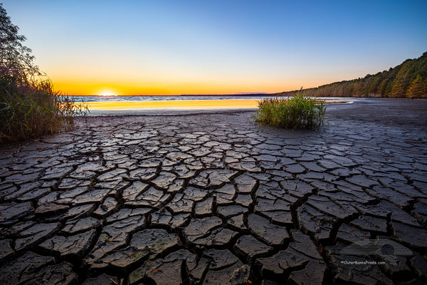 Lake Phelps is the second largest natural lake in North Carolina. It is located about an hour west of the Outer Banks. While fighting a forest fire near by, the lake level was lowered and exposed dugout canoes left by ancient Indians. The oldest of these canoes was built in the same error as the Egyptian pyramids.