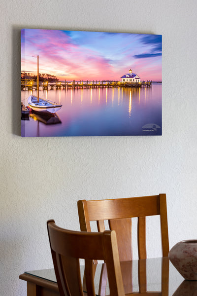 20"x30" x1.5" stretched canvas print hanging in the dining room of Roanoke Marshes Lighthouse and Shallowbag Bay at sunrise in Manteo on the Outer Banks of NC.