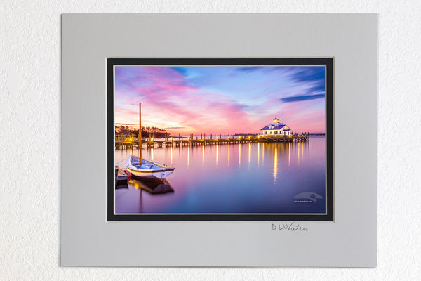 5 x 7 luster prints in a 8 x 10 ivory and black double mat of Roanoke Marshes Lighthouse and Shallowbag Bay at sunrise in Manteo on the Outer Banks of NC.