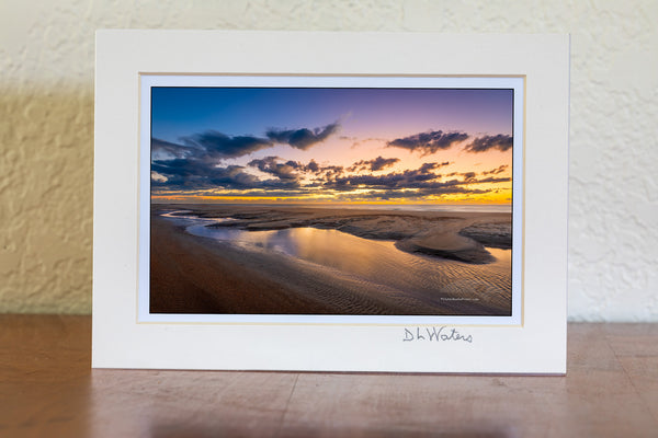This is in Buxton North Carolina on the beach next to the Cape Hatteras Lighthouse. I love photographing the beach because every time you go you have a new landscape to photograph