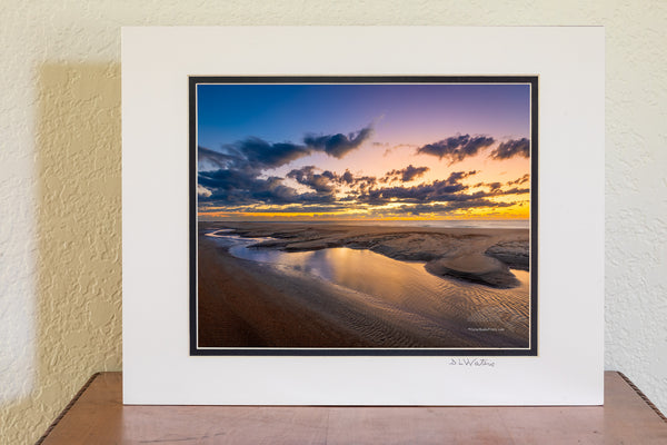 This is in Buxton North Carolina on the beach next to the Cape Hatteras Lighthouse. I love photographing the beach because every time you go you have a new landscape to photograph