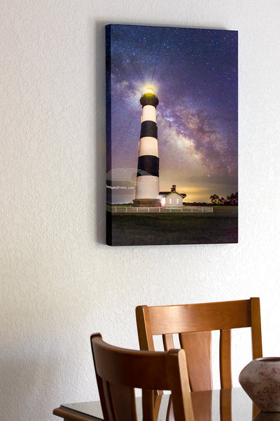 20"x30" x1.5" stretched canvas print hanging in the dining room of Bodie Island Lighthouse and a star filled sky including the Milky-way galaxy on the Outer Banks of North Carolina.