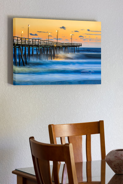 20"x30" x1.5" stretched canvas print hanging in the dining room of Sunrise with large surf at the Outer Banks Fishing Pier in South Nags Head.