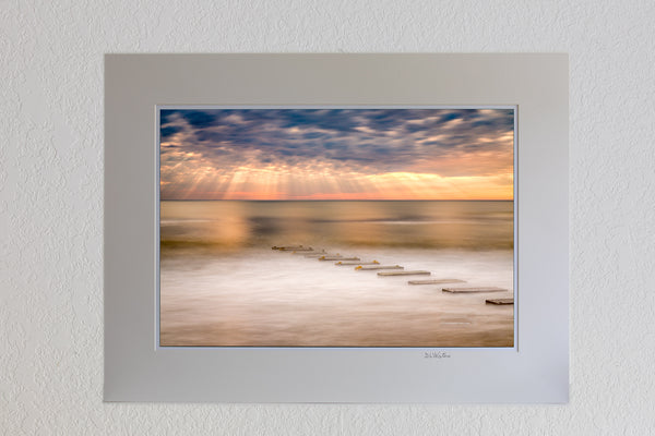13 x 19 luster print in 18 x 24 ivory mat of Long exposure of an amazing sky and a drainage outflow in Nags Head on the Outer Banks of NC.