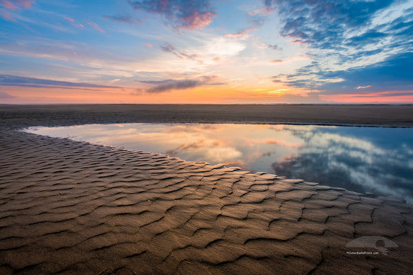 Sunrise tide pool at Cololla on the Outer Banks of NC.