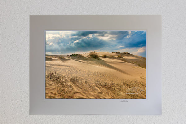 13 x 19 luster print in 18 x 24 ivory mat of Sand dunes and dramatic clouds at Jockey's Ridge State Park Nags Head NC. I Jockys Ridge is the largest sandune on the east coast.