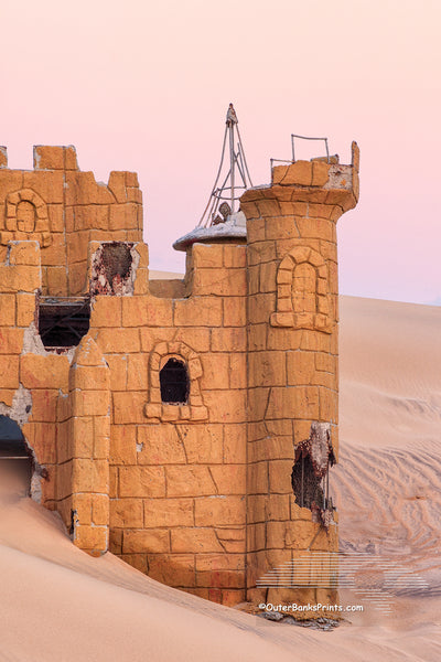 This is what remains of a putt putt golf course at Jockey's Ridge State Park. Over the years blowing sand has completely covered this castle. It has been slowly uncovered over the past 10 years and reburied.