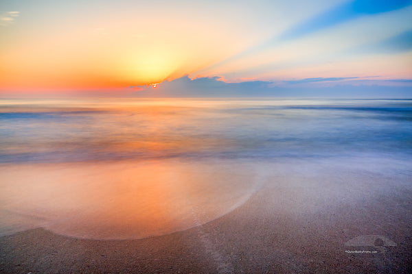 Sunrise over the beach and ocean on the Outer Banks of NC.
