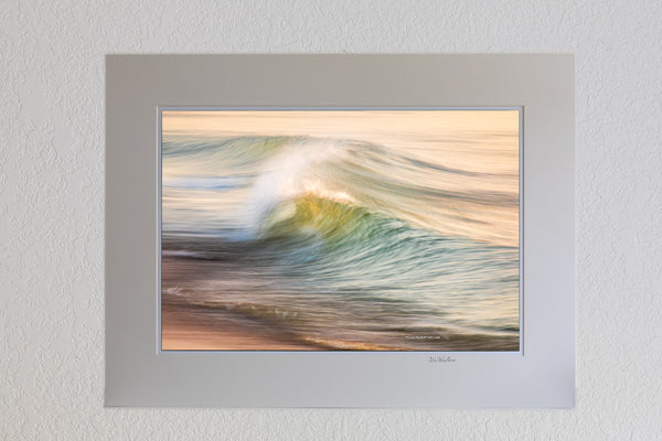 13 x 19 luster print in 18 x 24 ivory mat of Impression of motion in the early morning surf on the beach at Kitty Hawk on the Outer Banks of NC.