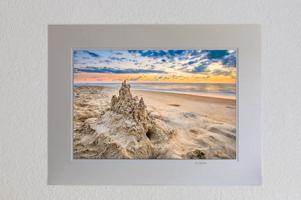 13 x 19 luster print in 18 x 24 ivory mat of A drip sandcastle at sunrise on an Outer Banks beach.