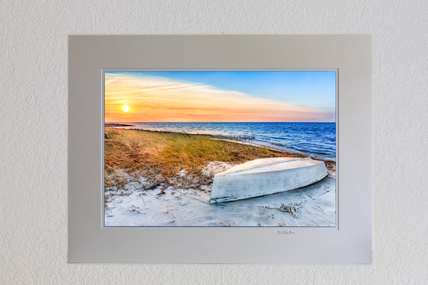 13 x 19 luster print in 18 x 24 ivory mat of Overturned boat at sunset on Cape Hatteras Island.