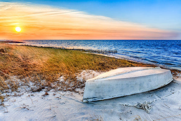 Overturned boat at sunset on Cape Hatteras Island.