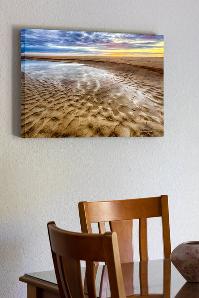 20"x30" x1.5" stretched canvas print hanging in the dining room of Sunrise reflection in a tide pool on a Corolla beach at Outer Banks, NC.