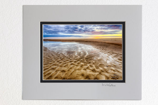 8 x 10 luster print in a 11 x 14 ivory and black double mat of Sunrise reflection in a tide pool on a Corolla beach at Outer Banks, NC.