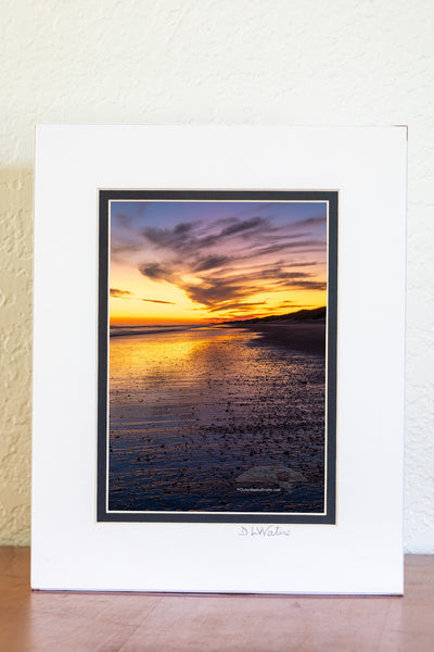 Just after sunset along Frico beach in Cape Hatteras National Seashore. Because the way Cape Point stretches out into the Atlantic ocean Frisco beach is one of the few places on the Outer Banks the sun rises and sets along the beach.