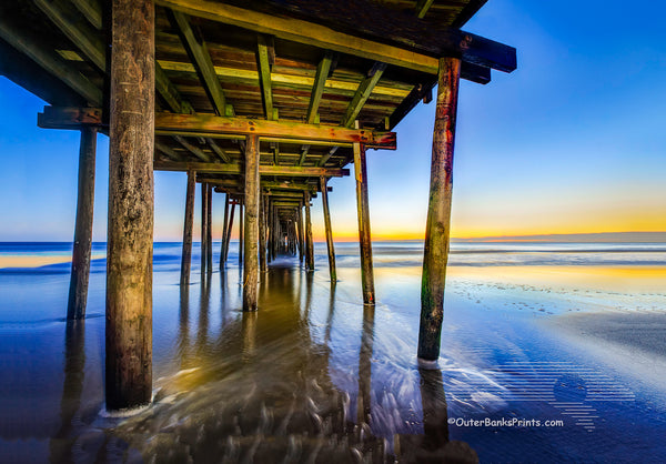 For this photo I used a flashlight while the shutter was open to paint in details under the pier.