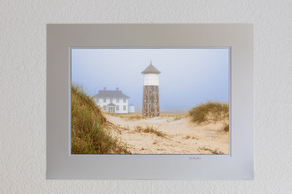 13 x 19 luster print in 18 x 24 ivory mat of A foggy morning at Washed Woods US Coast Guard station number 166, in Carova Beach on the Outer Banks of North Carolina.