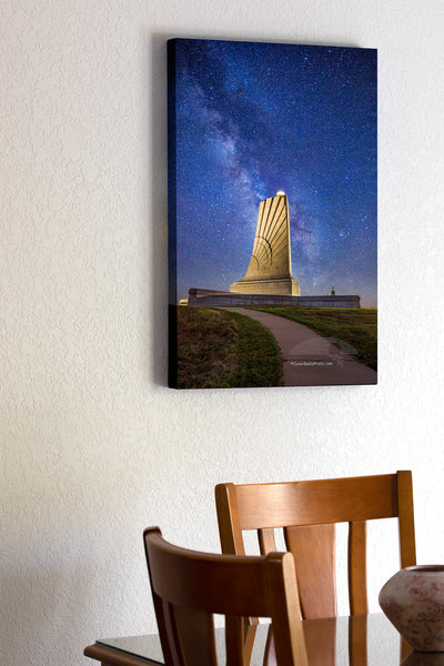 The only way I was able to capture this star filled Milky Way galaxy sky at the Wright Brothers National Memorial in Kill Devil Hills on the Outer Banks of North Carolina was to take two photographs and combine them in Photoshop. The light shining on the memorial is way too bright to capture the memorial and the stars in one exposure.