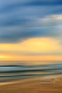 Moving the camera during exposure turns this Kitty Hawk beach scene into a kaleidoscope of colors.
